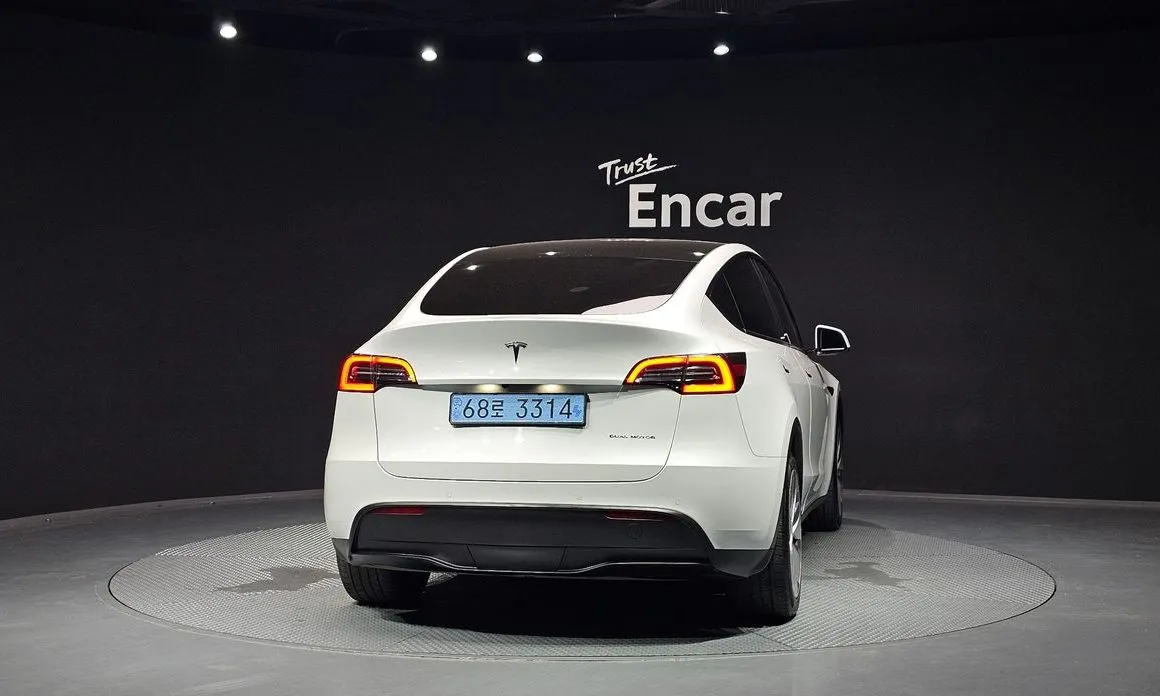 Tesla Model Y — фото 9