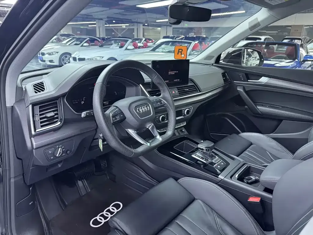Audi Q5L — фото 9