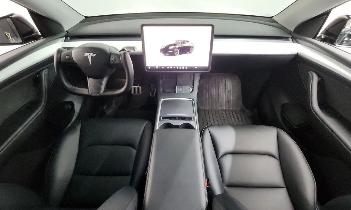 Tesla Model Y — фото 6