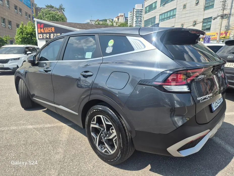 Kia Sportage — фото 9
