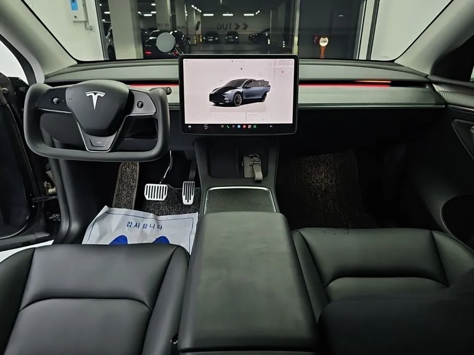 Tesla Model Y — фото 6