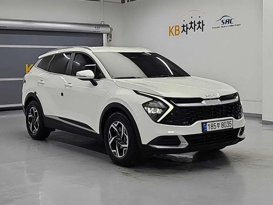 Kia Sportage — фото 6
