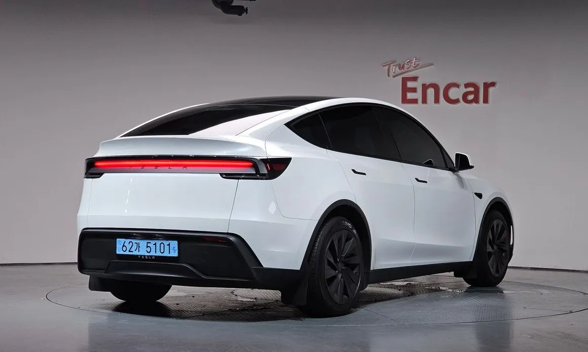 Tesla Model Y — фото 8