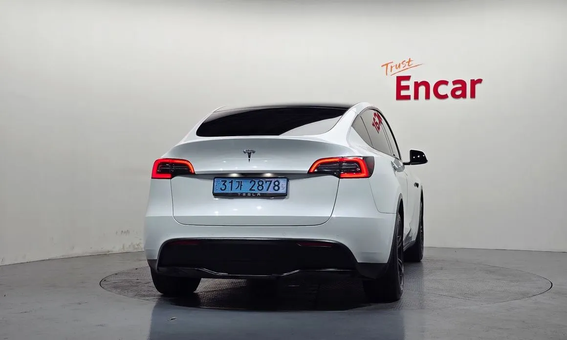 Tesla Model Y — фото 6