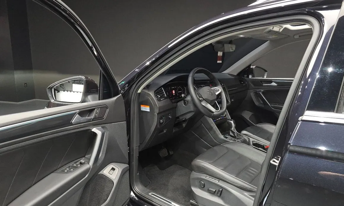 Volkswagen Tiguan — фото 7