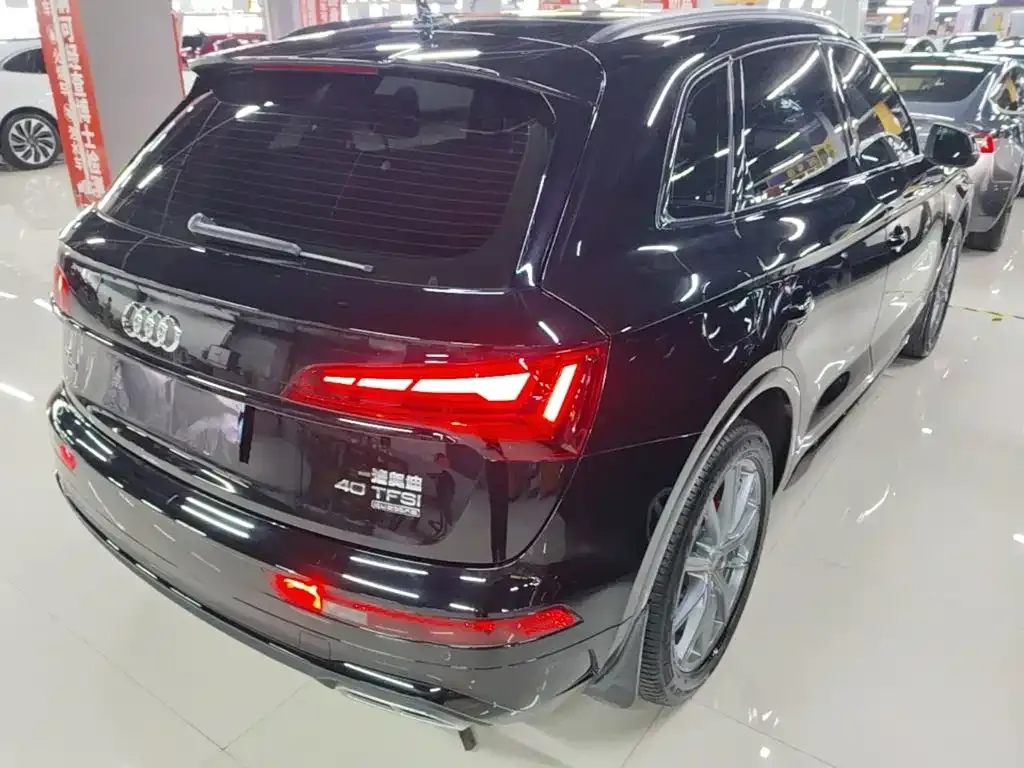 Audi Q5L — фото 10