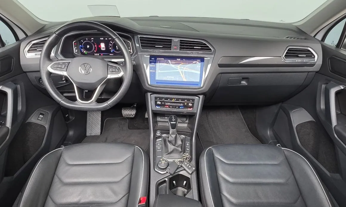 Volkswagen Tiguan — фото 10