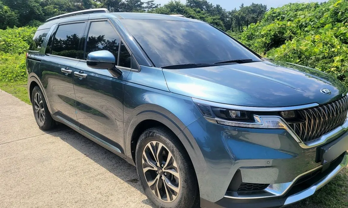 Kia Carnival — фото 10