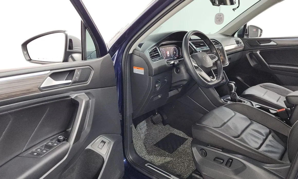 Volkswagen Tiguan — фото 9