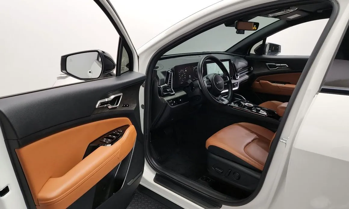 Kia Sportage — фото 10