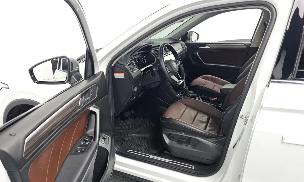 Volkswagen Tiguan — фото 8