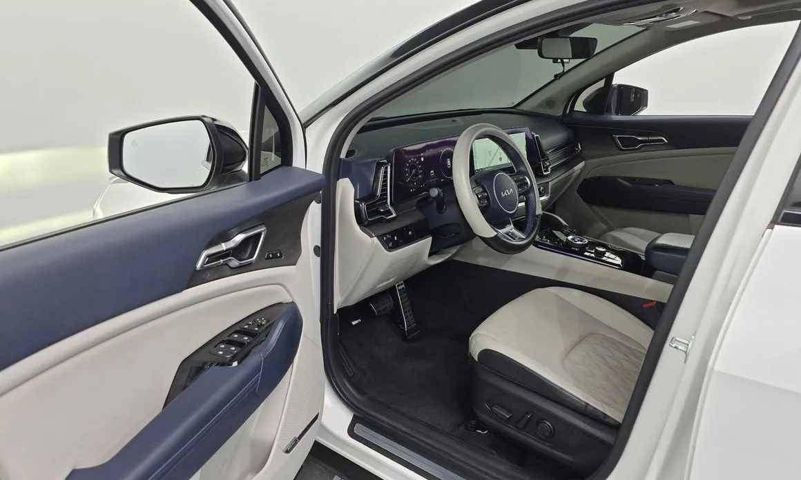 Kia Sportage — фото 9