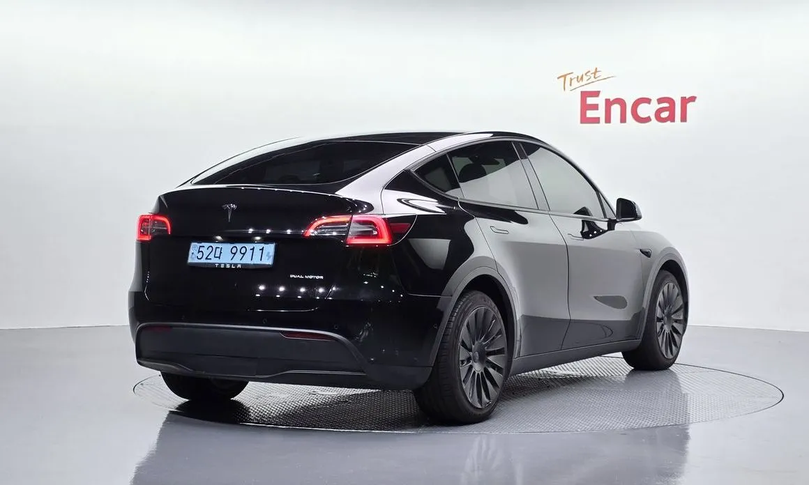 Tesla Model Y — фото 8