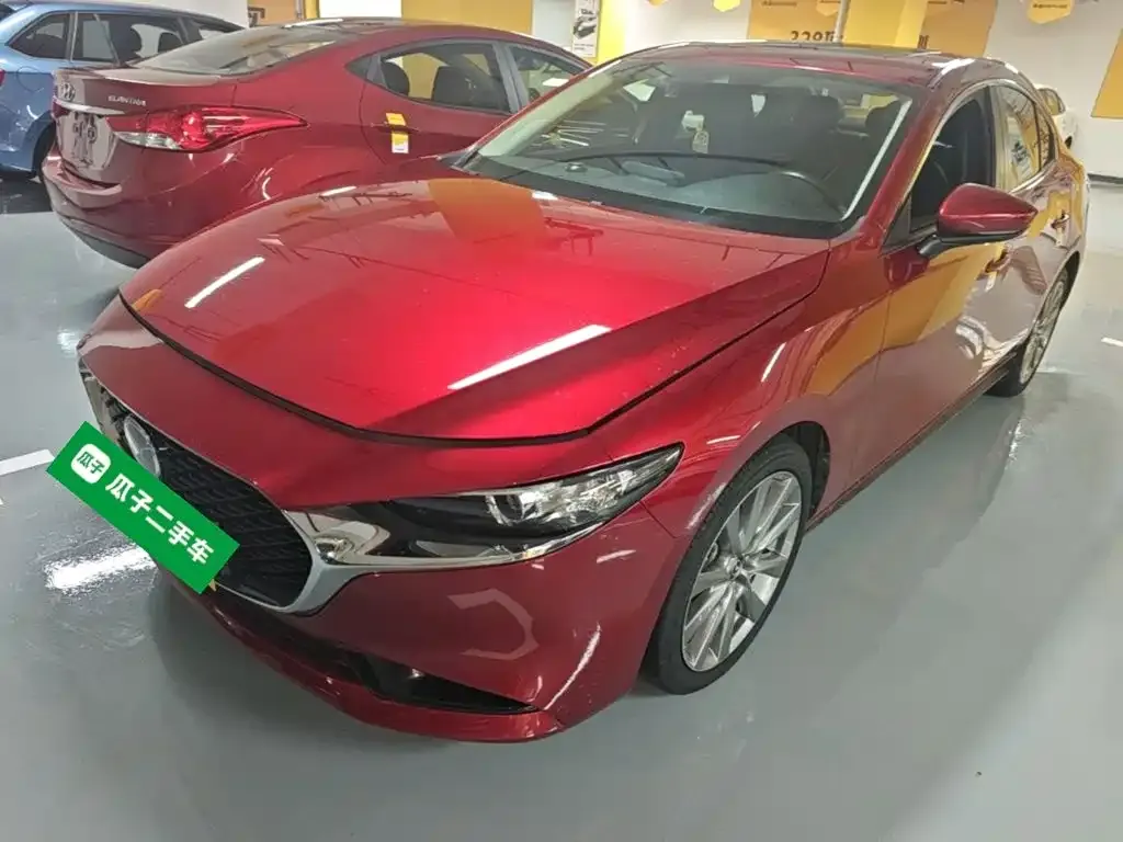 Mazda 3 Axela — фото 1