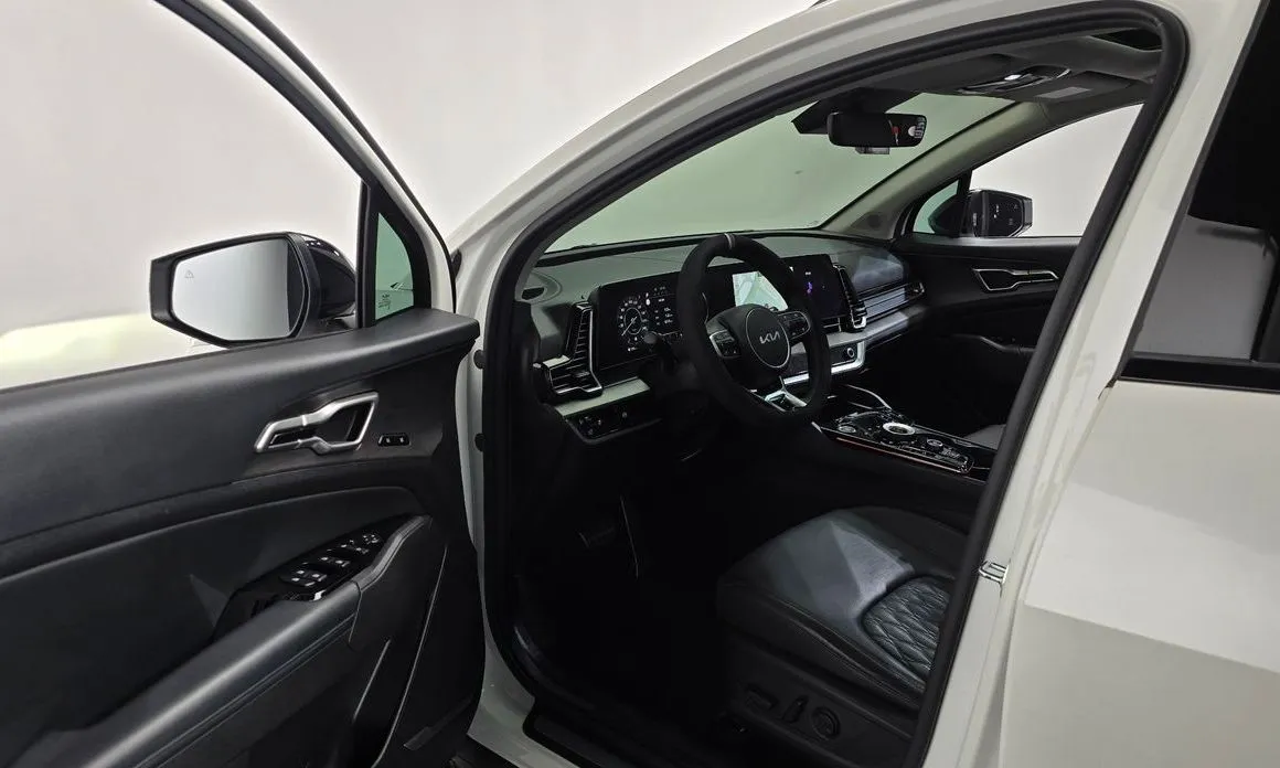 Kia Sportage — фото 7