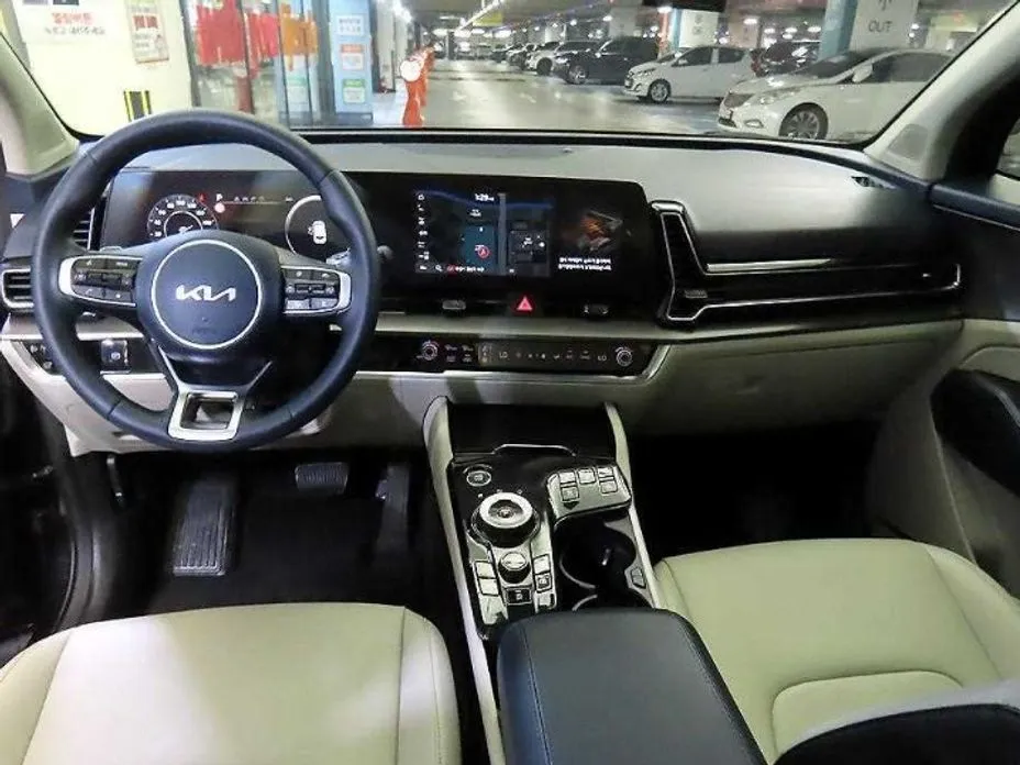 Kia Sportage — фото 10