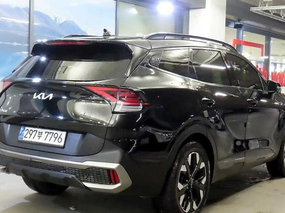Kia Sportage — фото 8