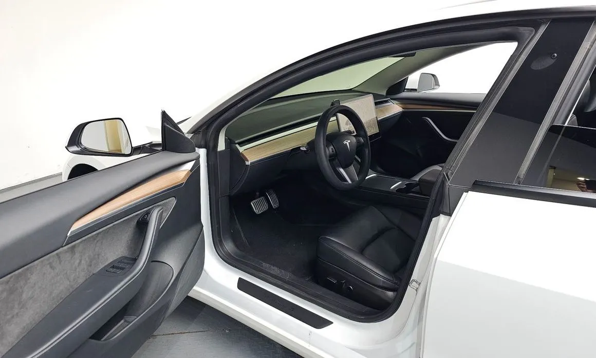 Tesla Model 3 — фото 10