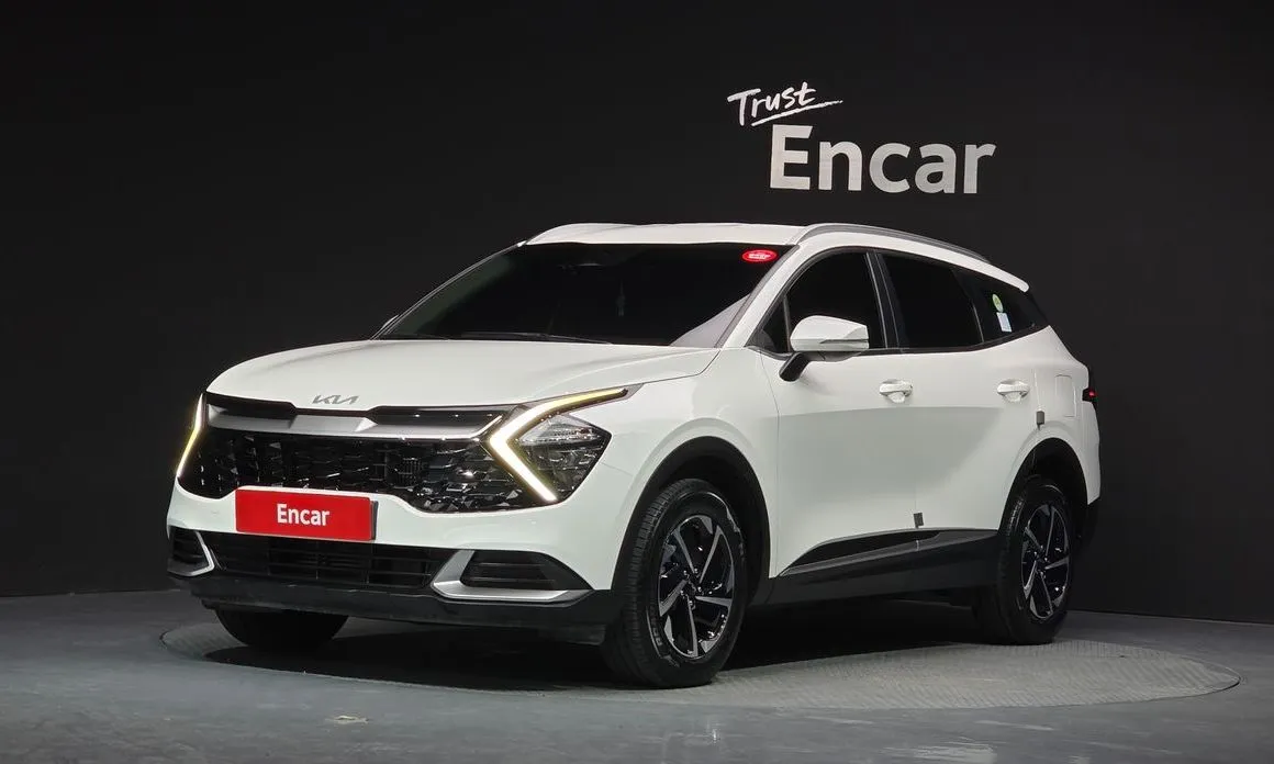 Kia Sportage — фото 1