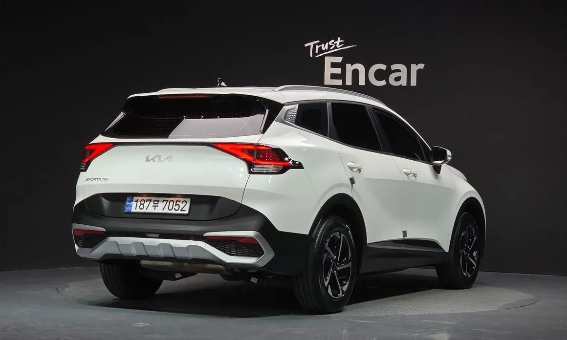 Kia Sportage — фото 7