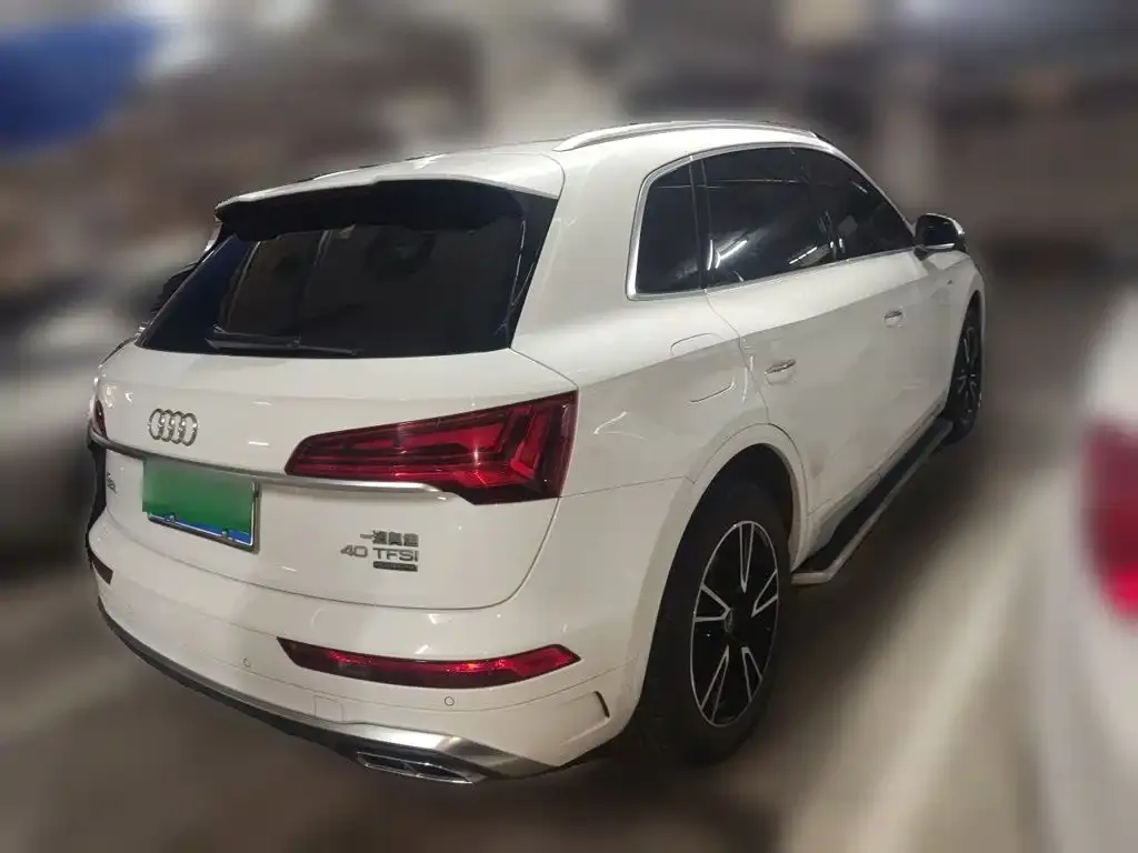Audi Q5L — фото 10