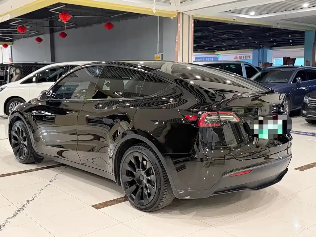 Tesla Model Y — фото 7