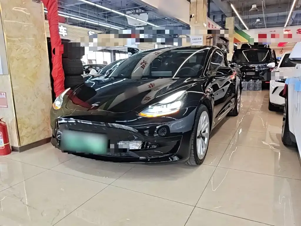 Tesla Model 3 — фото 10