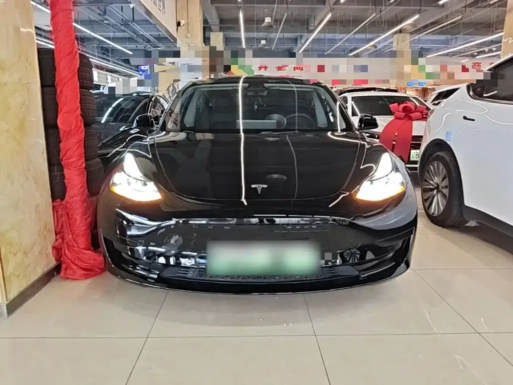 Tesla Model 3 — фото 7