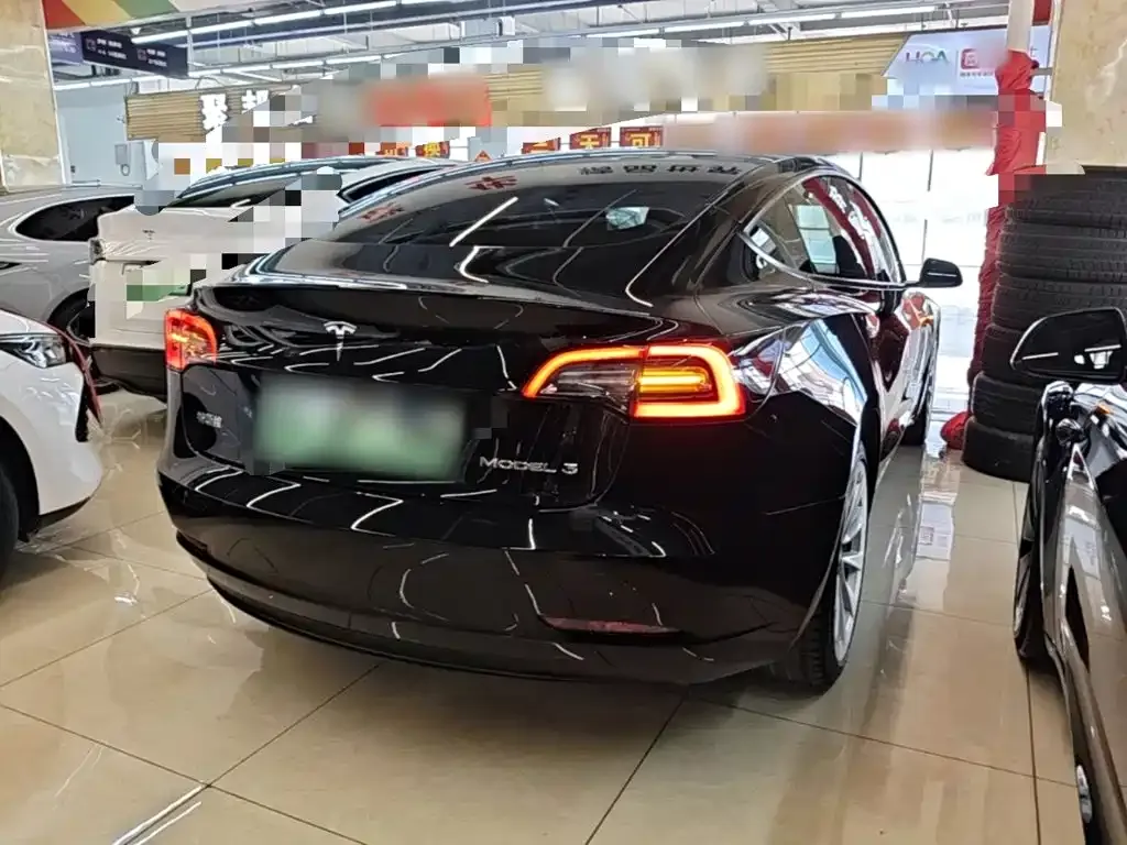 Tesla Model 3 — фото 9