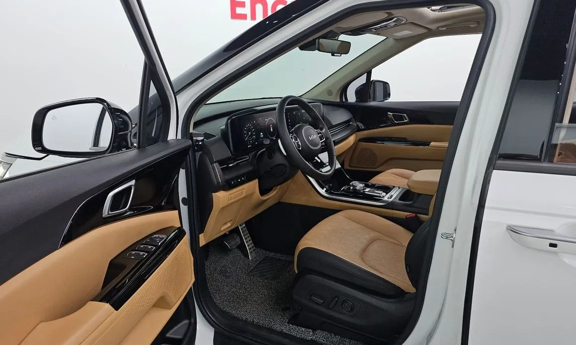 Kia Carnival — фото 10