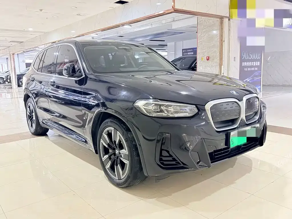 BMW iX3 — фото 8