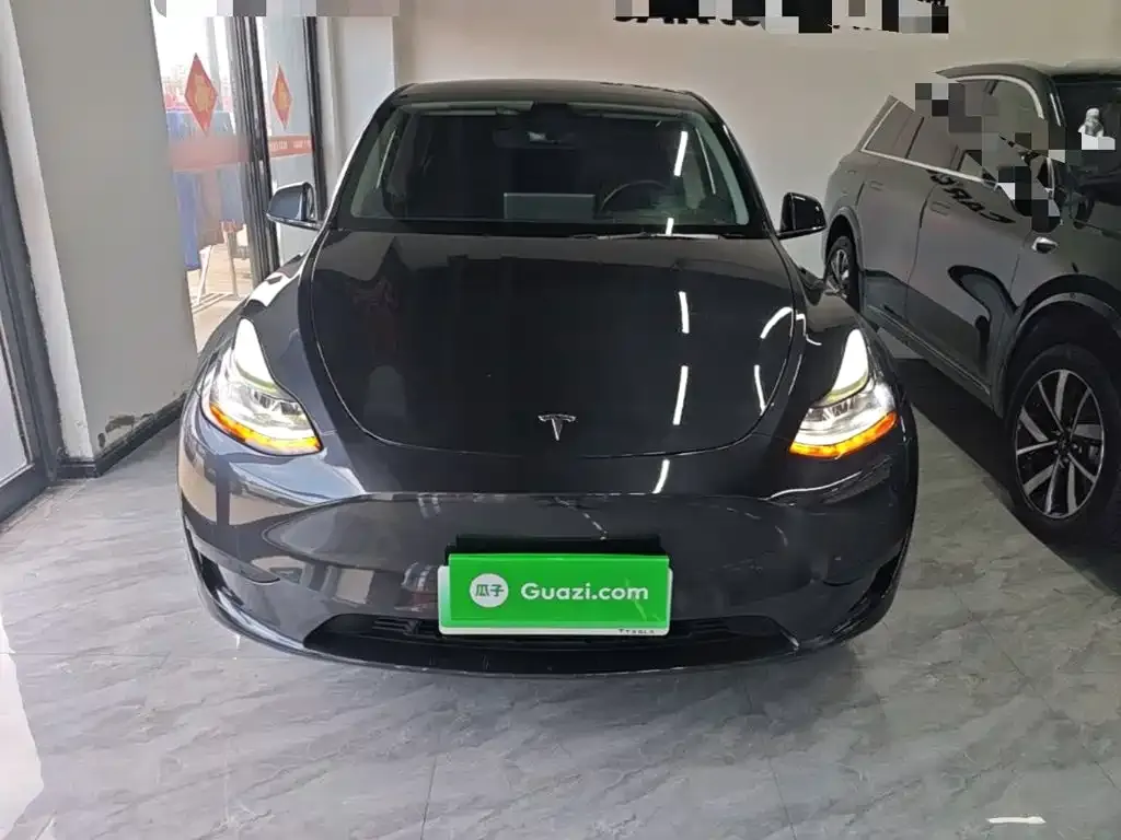 Tesla Model Y — фото 9