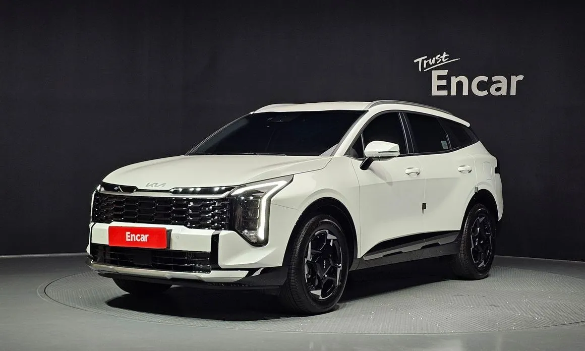 Kia Sportage — фото 1