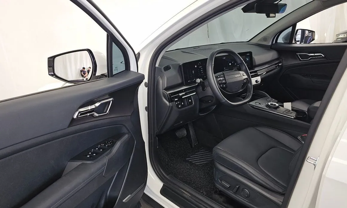 Kia Sportage — фото 8