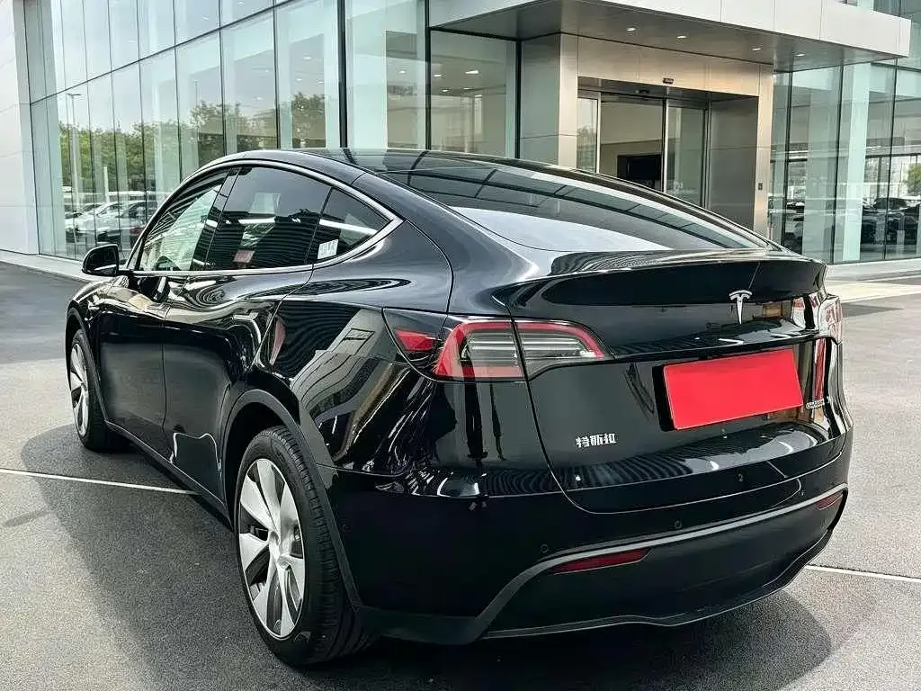 Tesla Model Y — фото 7