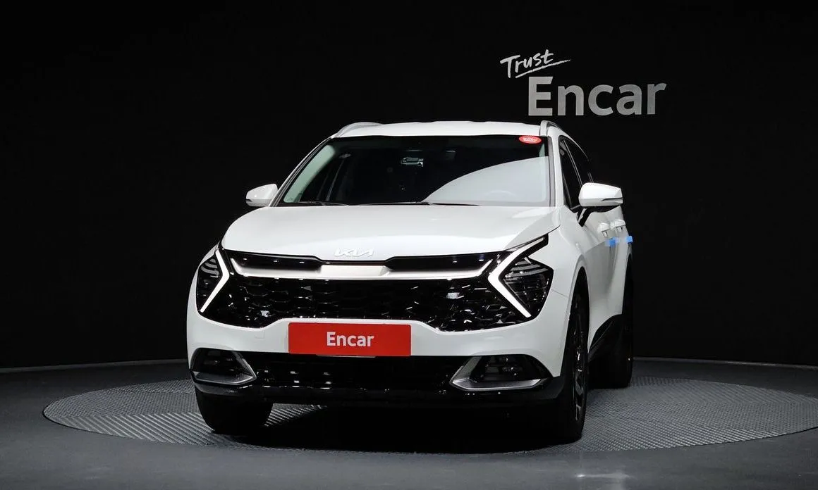 Kia Sportage — фото 8