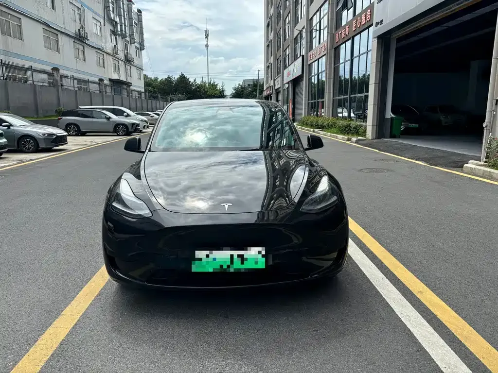 Tesla Model Y — фото 7