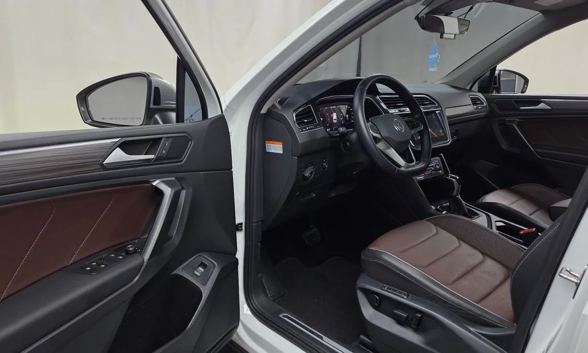 Volkswagen Tiguan — фото 7