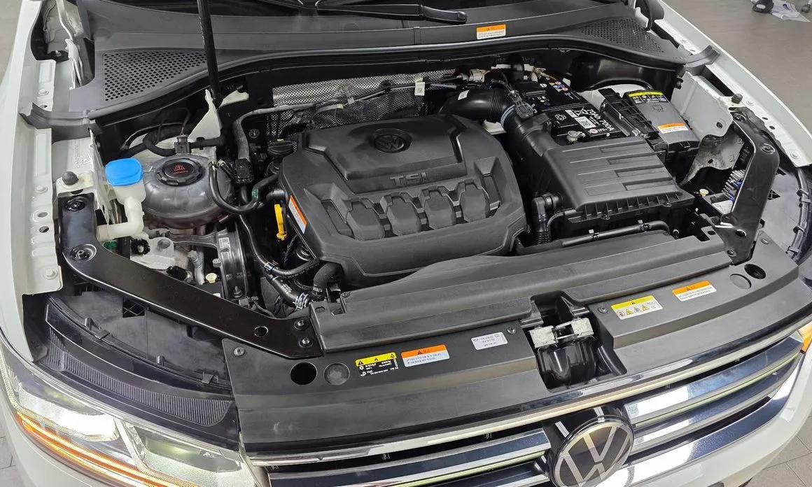 Volkswagen Tiguan — фото 10