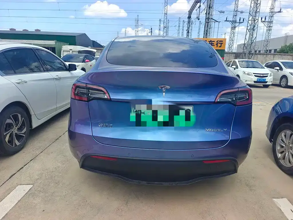 Tesla Model Y — фото 7