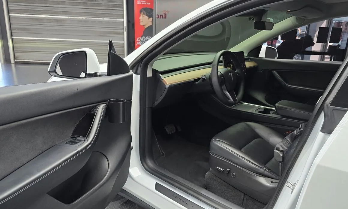 Tesla Model Y — фото 10