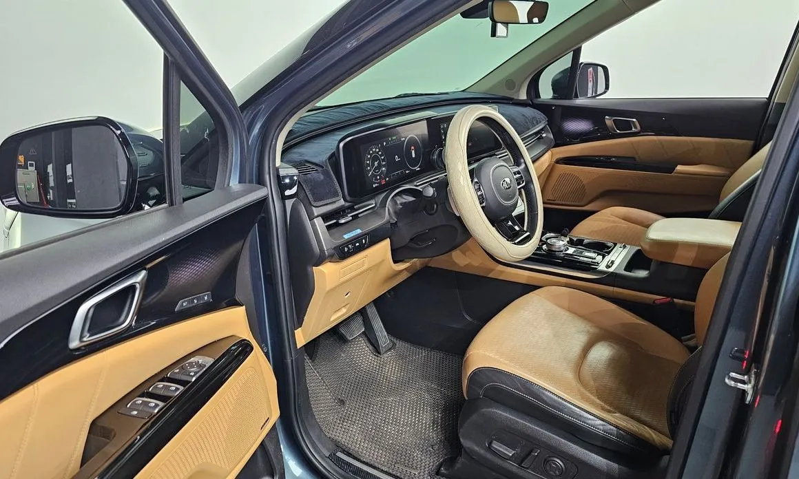 Kia Carnival — фото 10