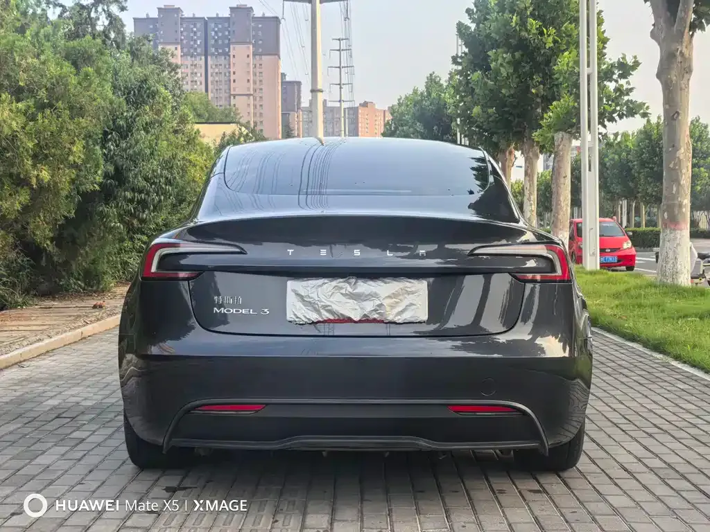 Tesla Model 3 — фото 5
