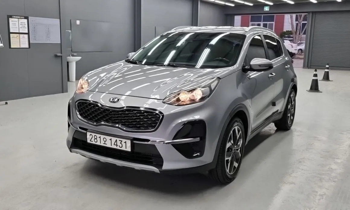 Kia Sportage — фото 1