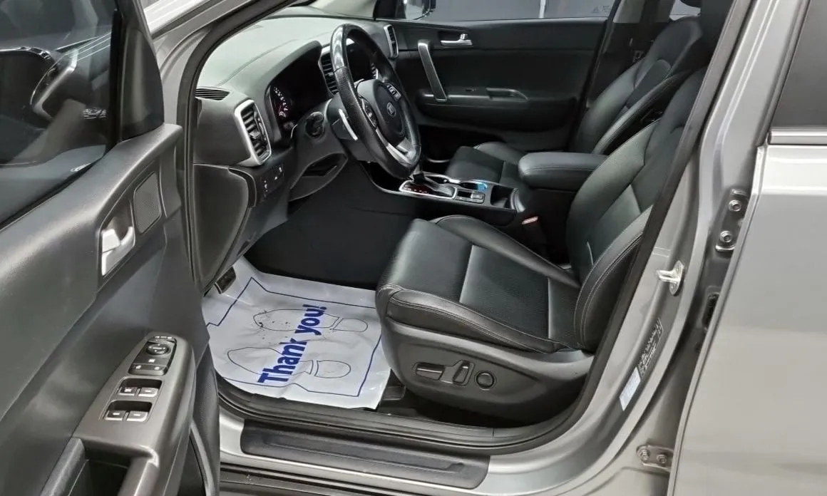 Kia Sportage — фото 8