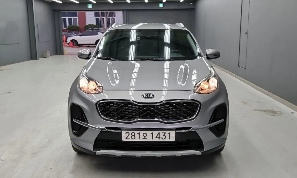 Kia Sportage — фото 5