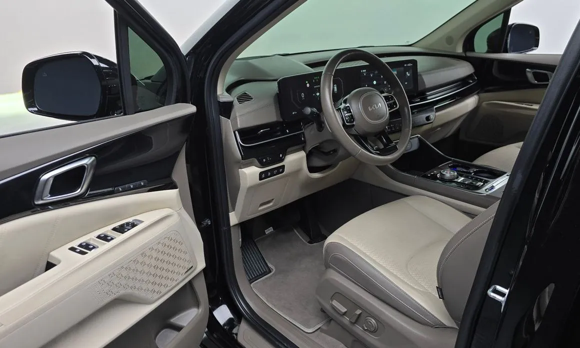 Kia Carnival — фото 10