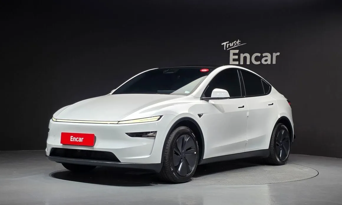 Tesla Model Y — фото 1
