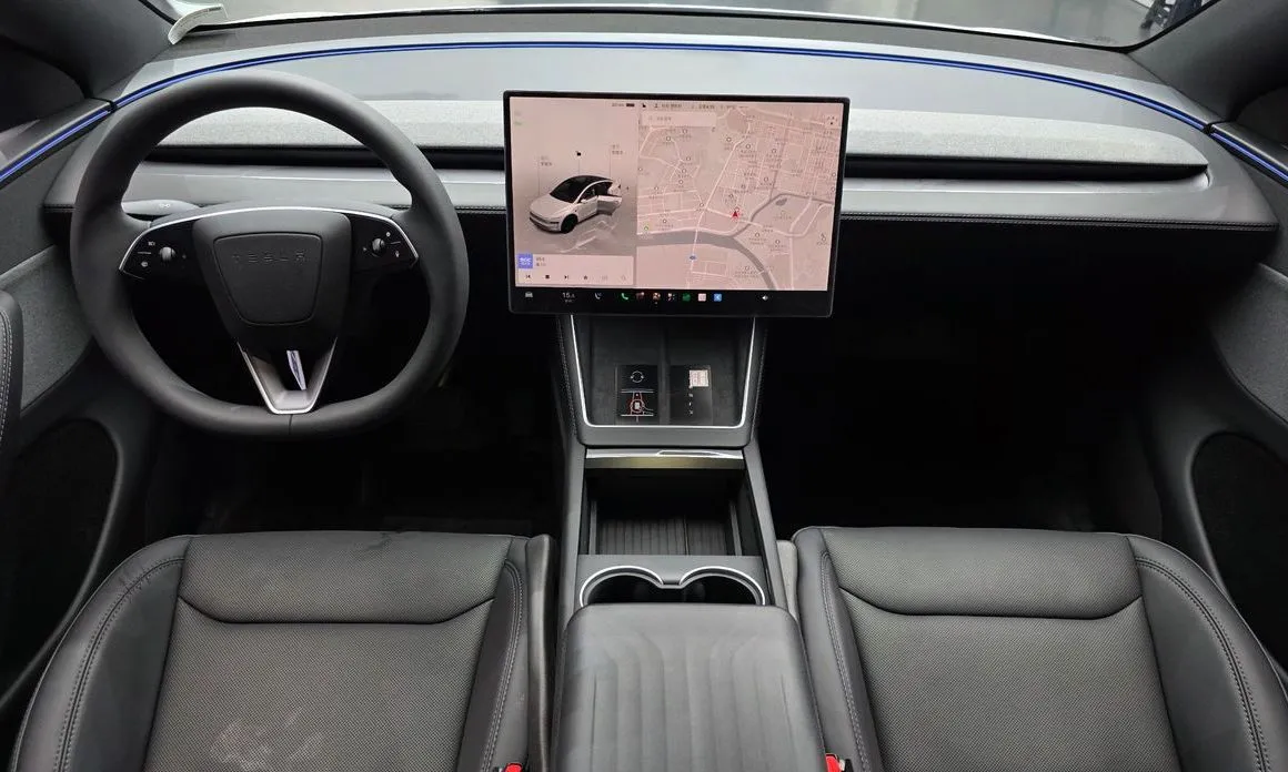 Tesla Model Y — фото 6