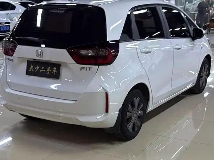 Honda Fit — фото 7